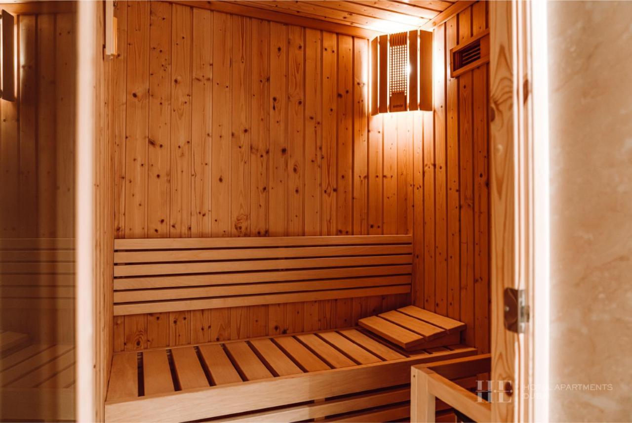 He Hotel Apartments Dubai Exteriör bild A Finnish sauna